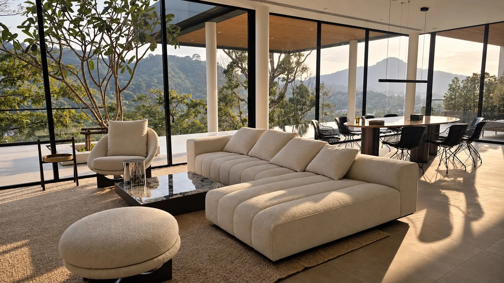 Perch House, living room with a cream sectional and floor-to-ceiling glass facing the hills